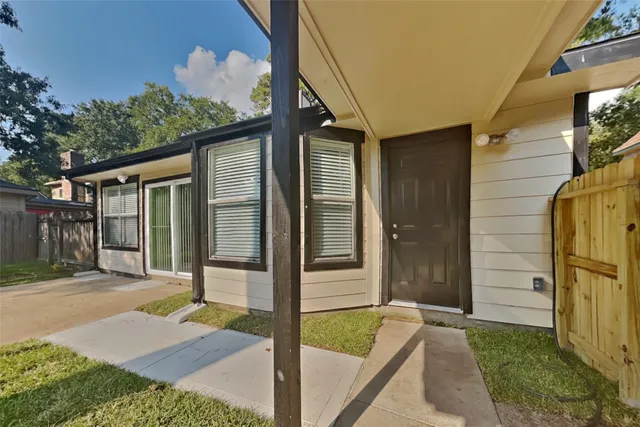 a front view of a house with a porch