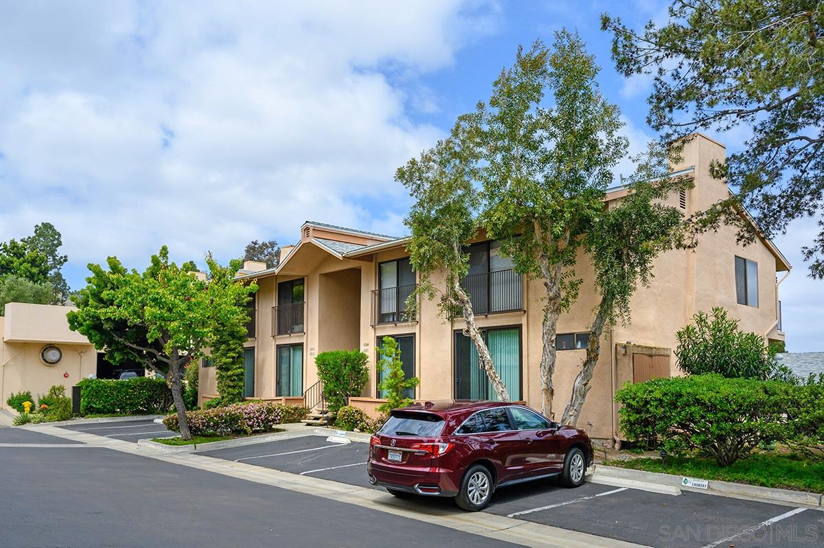 4266 Sixth Avenue San Diego, CA 92103 - Photo 2 of 29 a car parked in front of a brick house