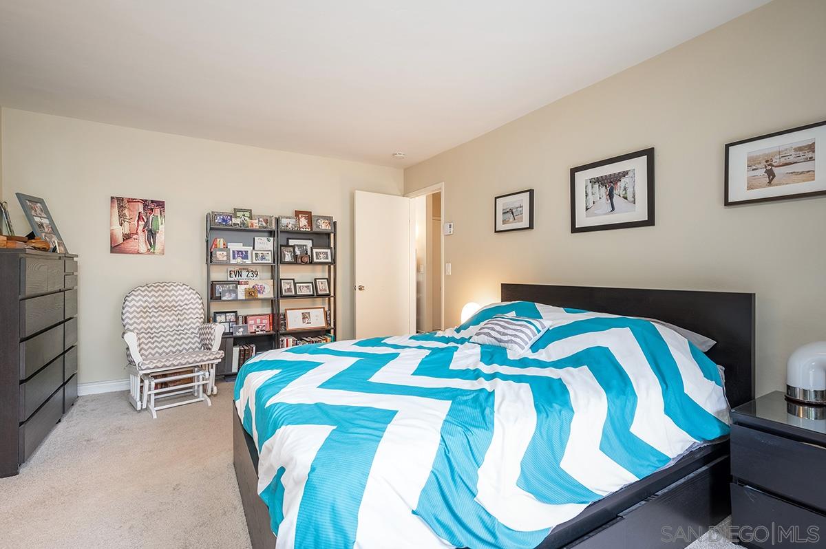 4266 Sixth Avenue San Diego, CA 92103 - Photo 18 of 29 a bedroom with a bed and a closet
