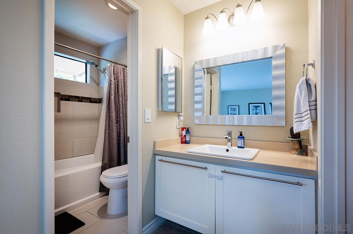 4266 Sixth Avenue San Diego, CA 92103 - Photo 19 of 29 a bathroom with a sink toilet and shower