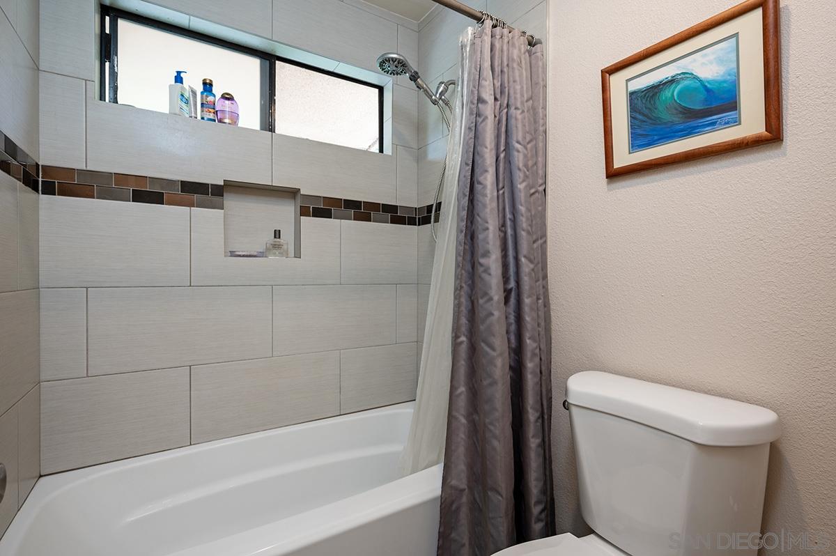 4266 Sixth Avenue San Diego, CA 92103 - Photo 20 of 29 a bathroom with a toilet and a shower