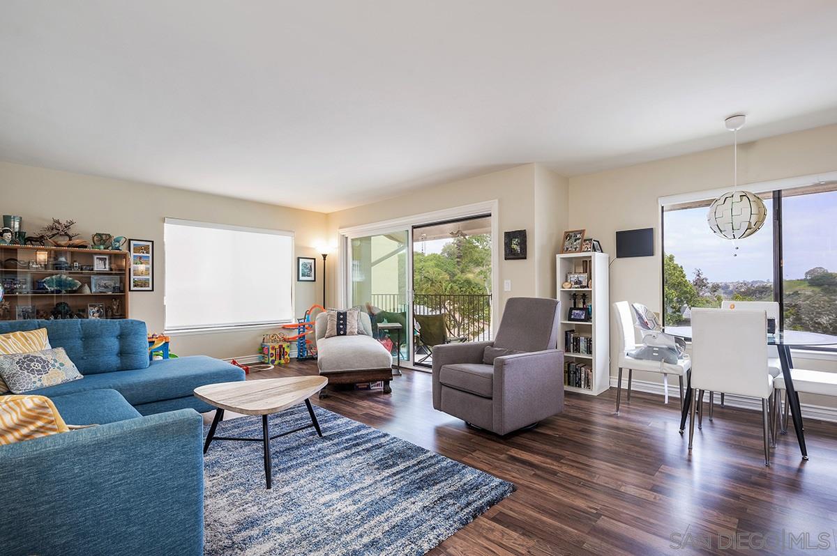 4266 Sixth Avenue San Diego, CA 92103 - Photo 6 of 29 a living room with furniture and a large window
