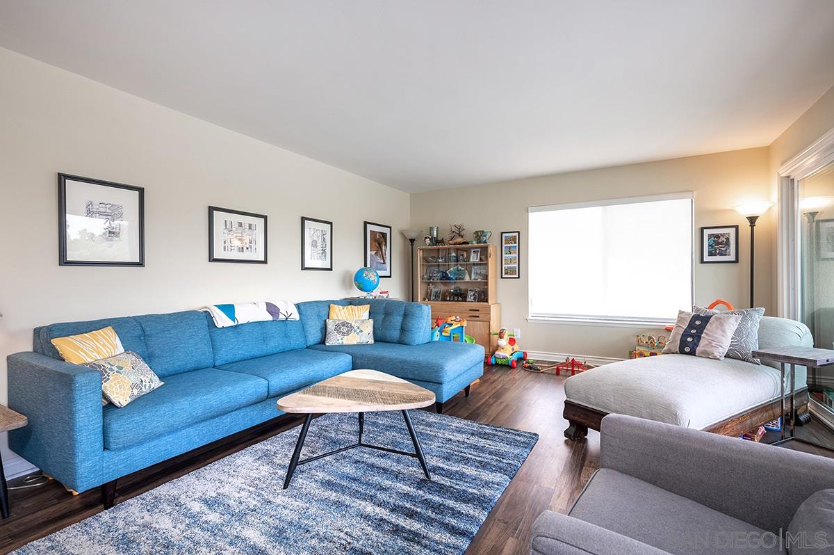 4266 Sixth Avenue San Diego, CA 92103 - Photo 7 of 29 a living room with furniture wooden floor and a table