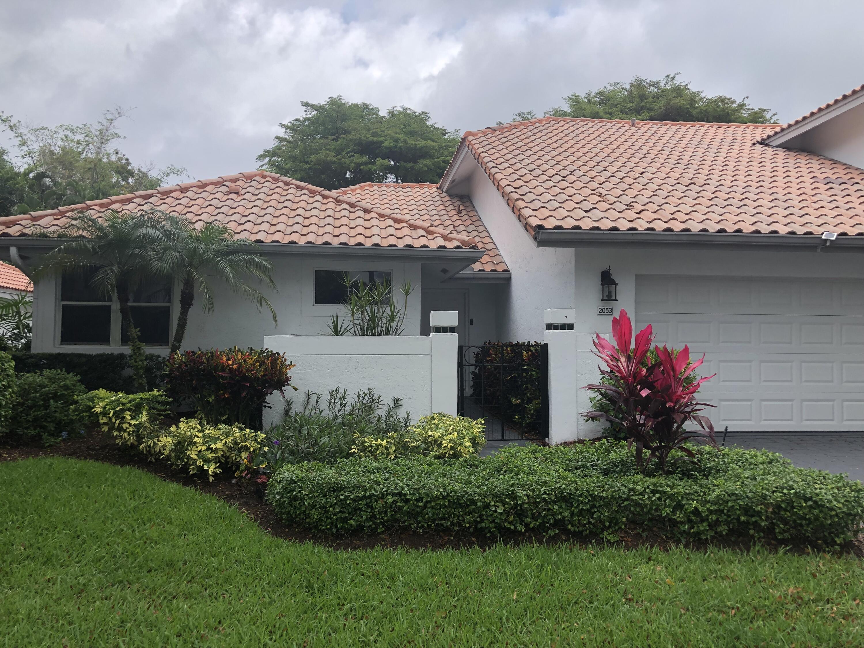 2053 Northwest 52nd Street Boca Raton, FL 33496 - Photo 1 of 14 Front View