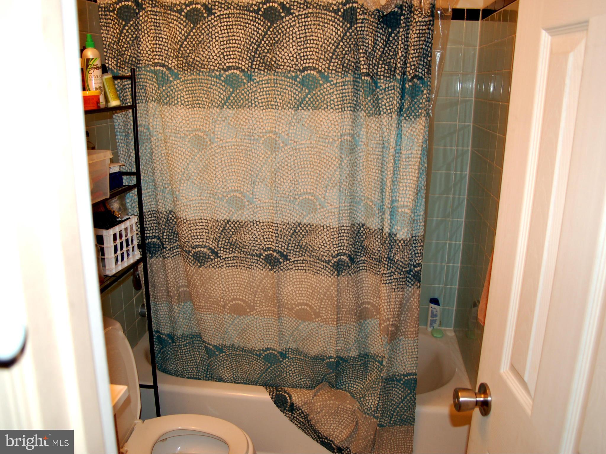 820 Anvil Road Fredericksburg, VA 22405 - Photo 10 of 10 a bathroom with a shower and toilet