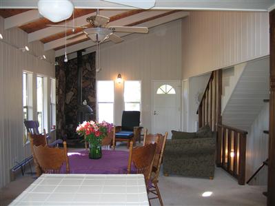 4103 Sonoma Mountain Road Santa Rosa, CA 95404 - Photo 7 of 8 a dining room with furniture and flowers