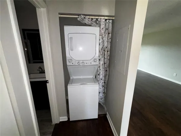 a close view of a utility room with washer and dryer