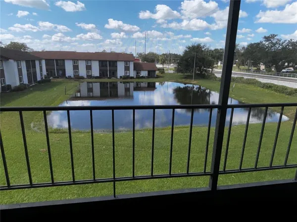 a view of a small yard from a balcony