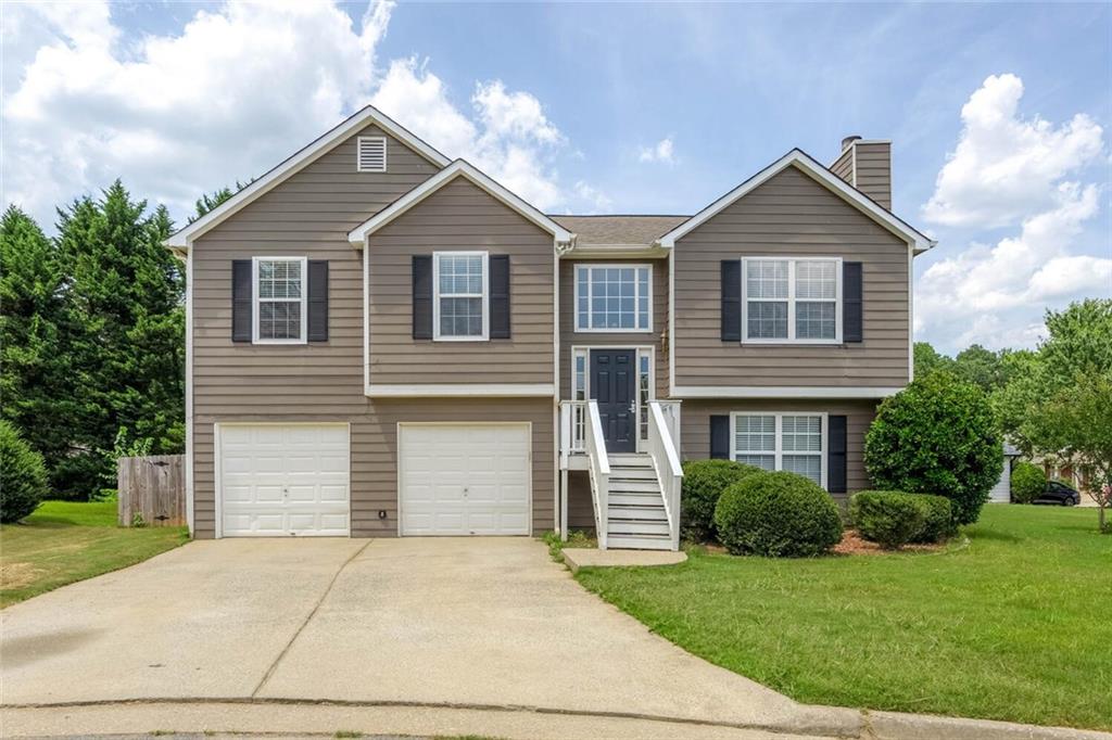 3272 Peach Court Acworth, GA 30101 - Photo 2 of 52 a front view of a house with a yard