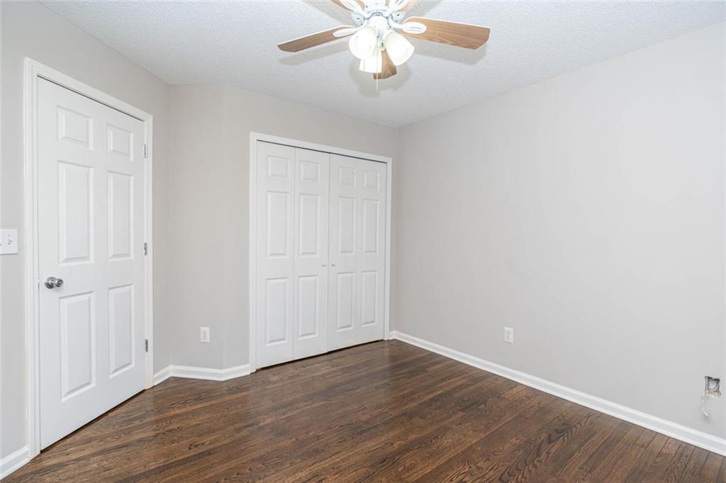 3272 Peach Court Acworth, GA 30101 - Photo 27 of 52 a view of an empty room with wooden floor