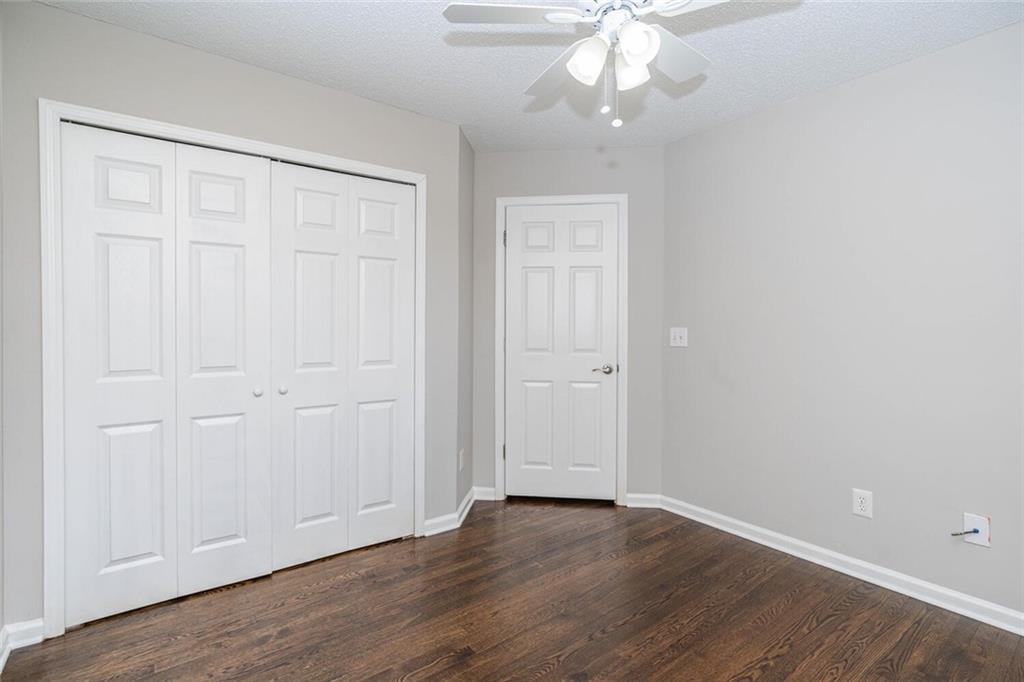 3272 Peach Court Acworth, GA 30101 - Photo 30 of 52 a view of an empty room with wooden floor