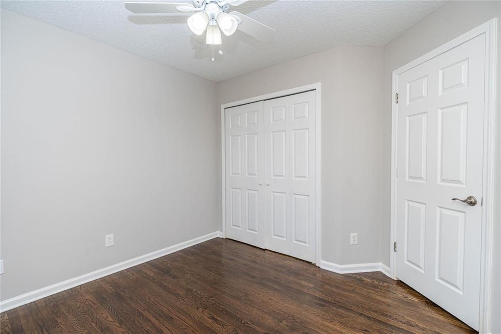 3272 Peach Court Acworth, GA 30101 - Photo 32 of 52 a view of an empty room with wooden floor