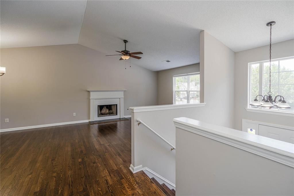3272 Peach Court Acworth, GA 30101 - Photo 4 of 52 a view of empty room with kitchen and window