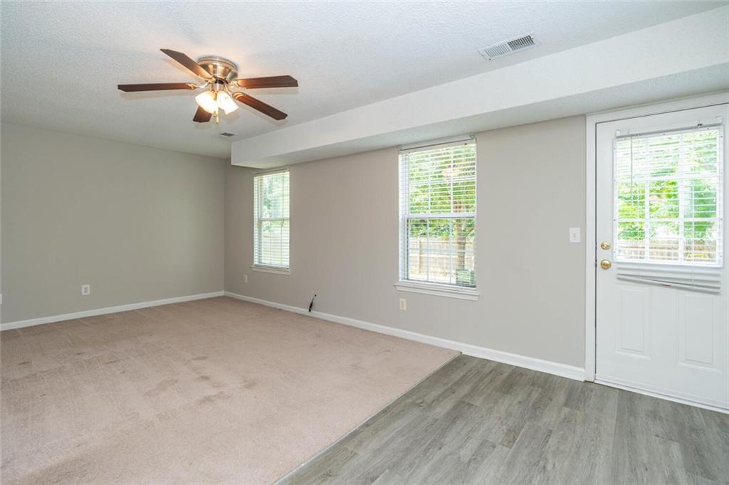 3272 Peach Court Acworth, GA 30101 - Photo 43 of 52 wooden floor in an empty room with a window