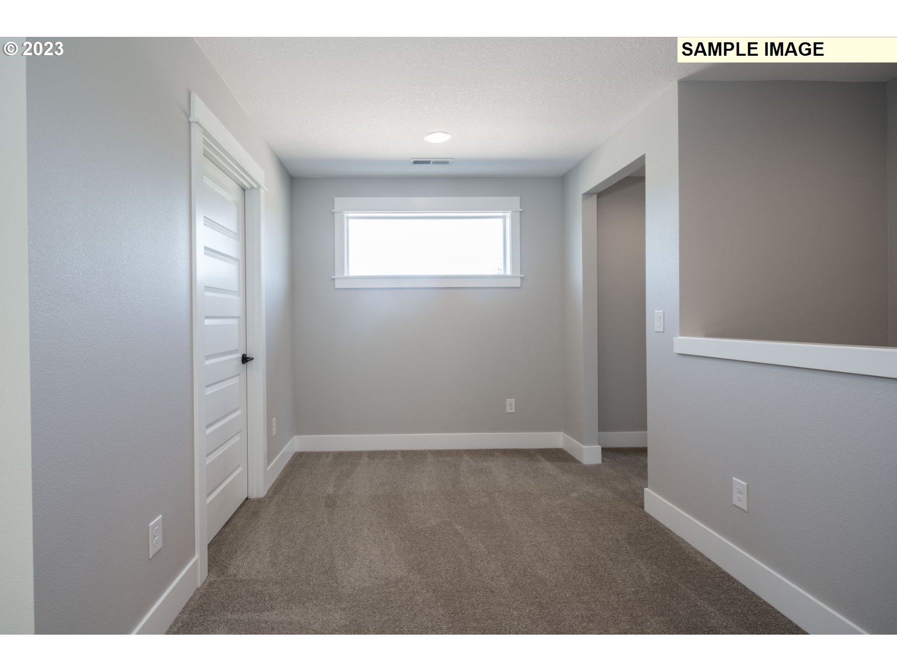 1101 South 46th Place Ridgefield, WA 98642 - Photo 14 of 22 a view of an empty room with window and closet area