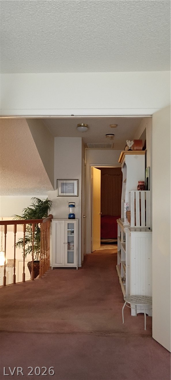 934 Derringer Lane Henderson, NV 89014 - Photo 34 of 49 Upsairs Hallway to 3 bedrooms. featurying vaulted ceiling