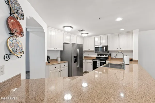 a view of a dining room with furniture