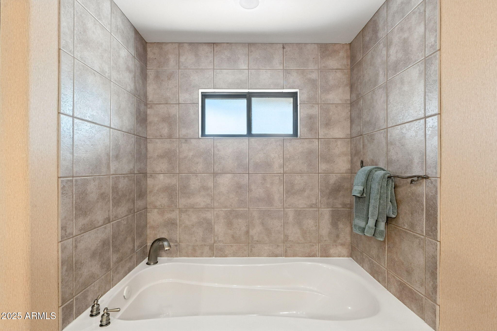36601 North Mule Train Road, Unit B19 Carefree, AZ 85377 - Photo 34 of 53 a bathroom with a bathtub