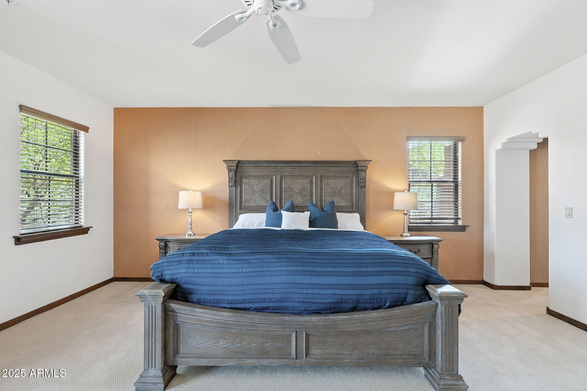 36601 North Mule Train Road, Unit B19 Carefree, AZ 85377 - Photo 42 of 53 a bed sitting in a spacious bedroom next to a window