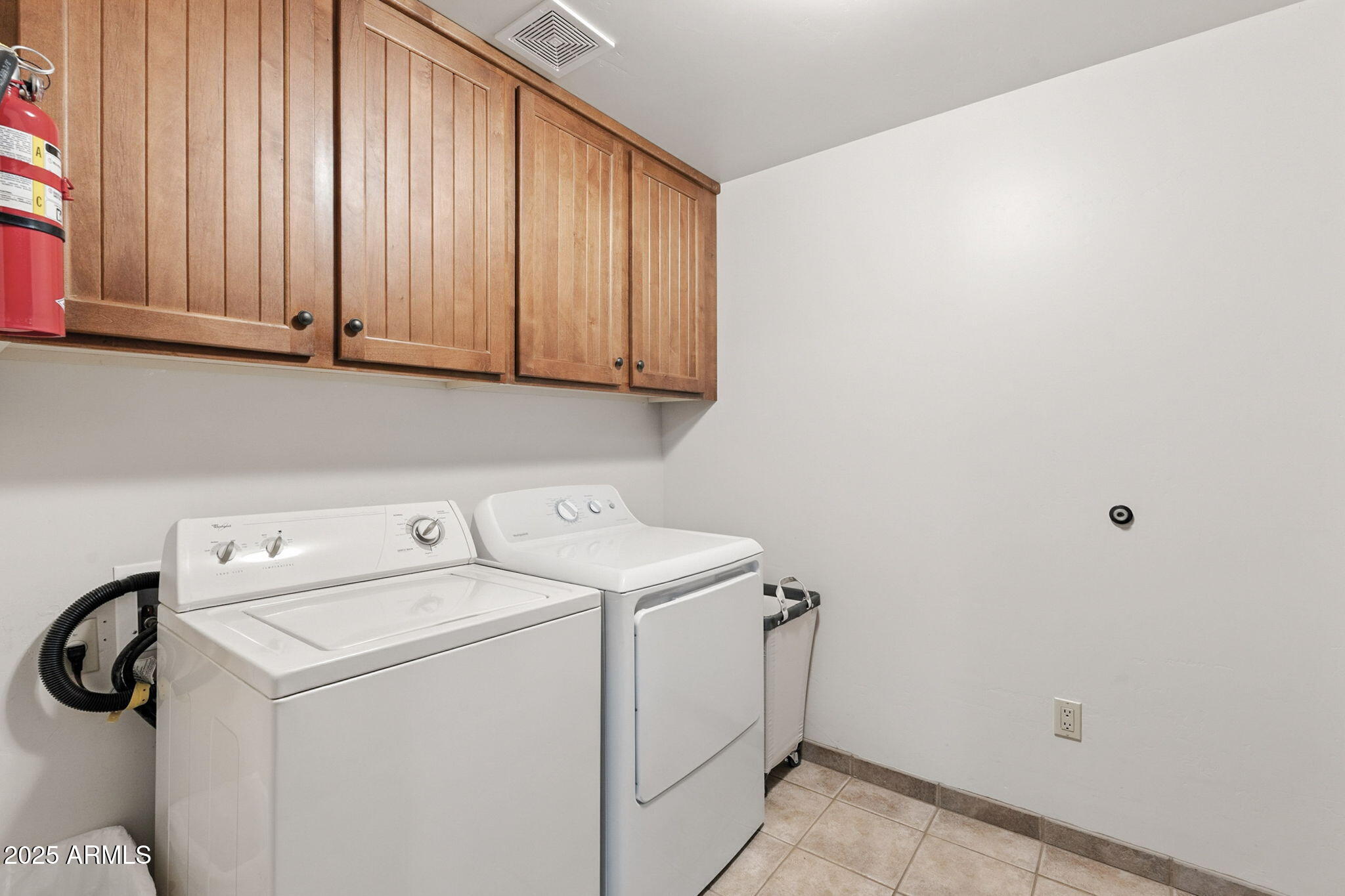 36601 North Mule Train Road, Unit B19 Carefree, AZ 85377 - Photo 48 of 53 a utility room with dryer and washer