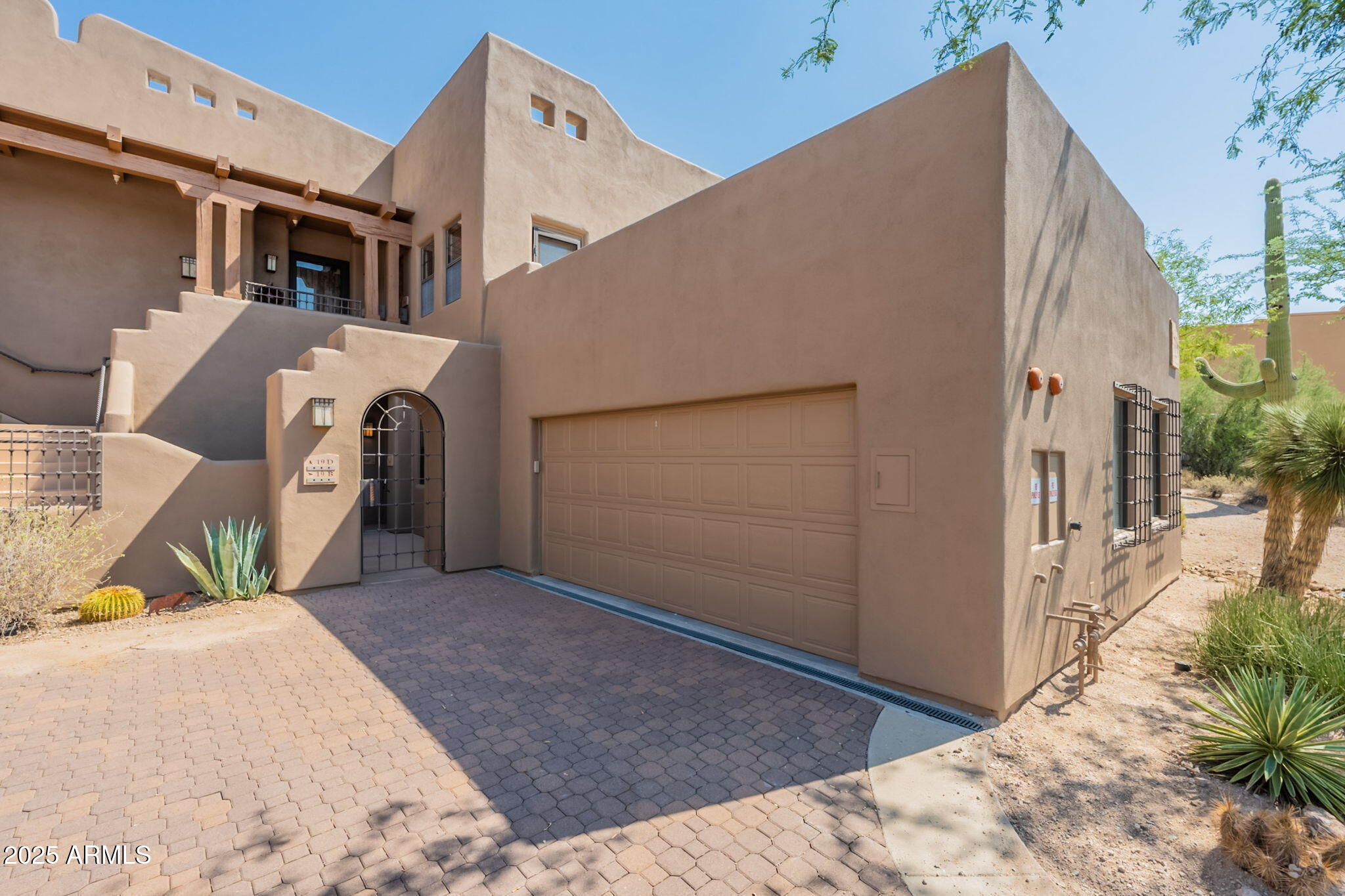 36601 North Mule Train Road, Unit B19 Carefree, AZ 85377 - Photo 6 of 48 a view of a house with a backyard