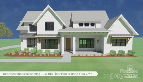 a front view of a house with a garden and plants