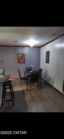 a workspace with furniture and window