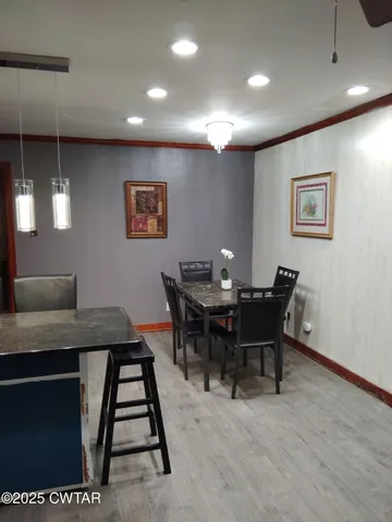 a view of a dining room with furniture