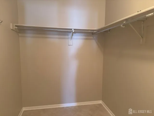 a view of an empty walk in closet