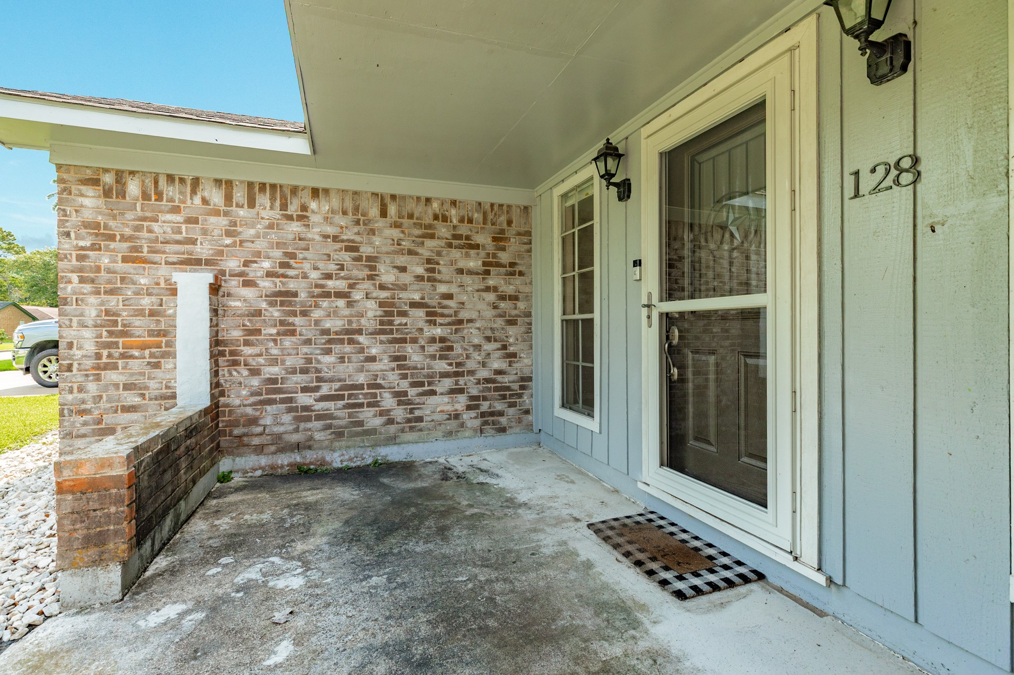 128 Houston Street Angleton, TX 77515 - Photo 16 of 25 a bathroom with a shower and a sink