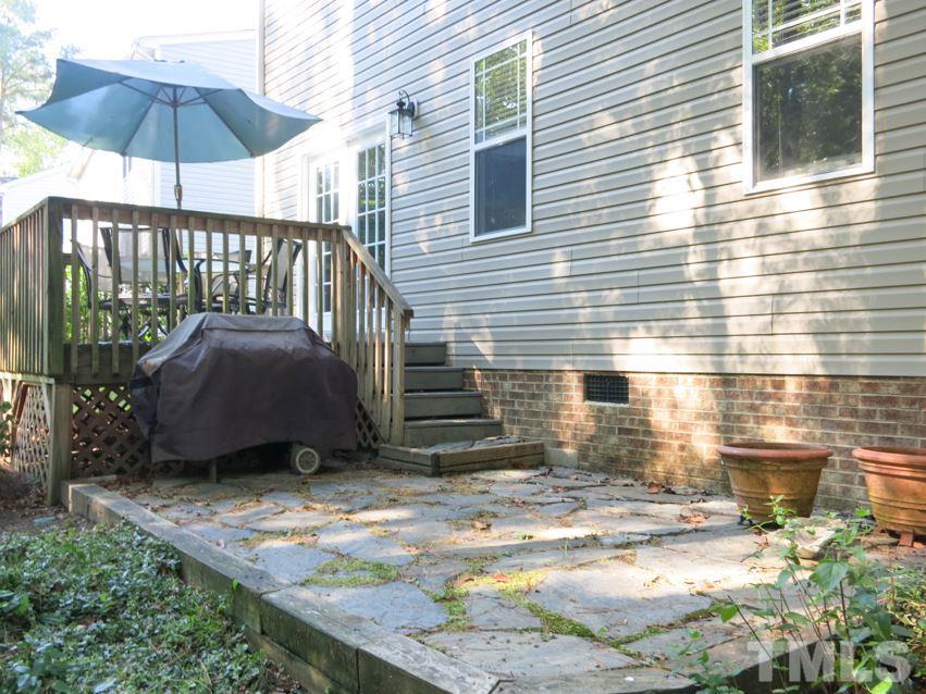 4629 Landover Crest Drive Raleigh, NC 27616 - Photo 21 of 25 Off the Deck is the spacious stone Patio.