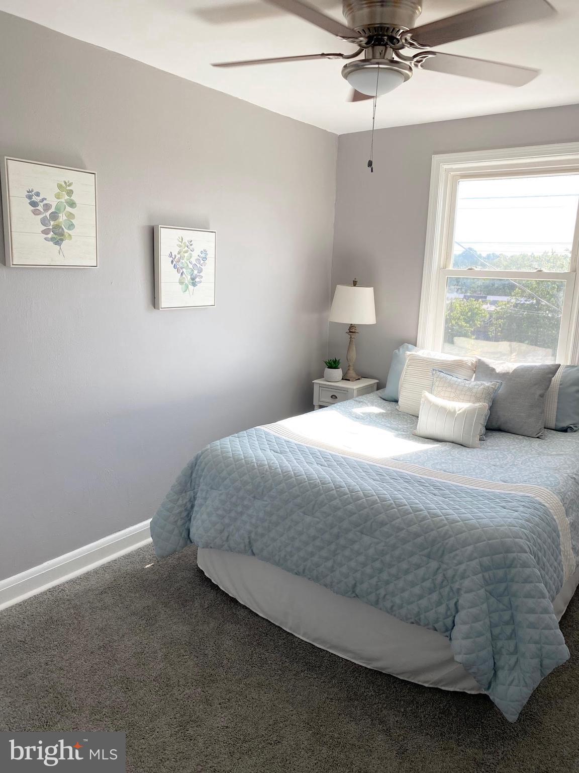 5019 Schaub Avenue Baltimore, MD 21206 - Photo 25 of 34 a bedroom with a bed and window