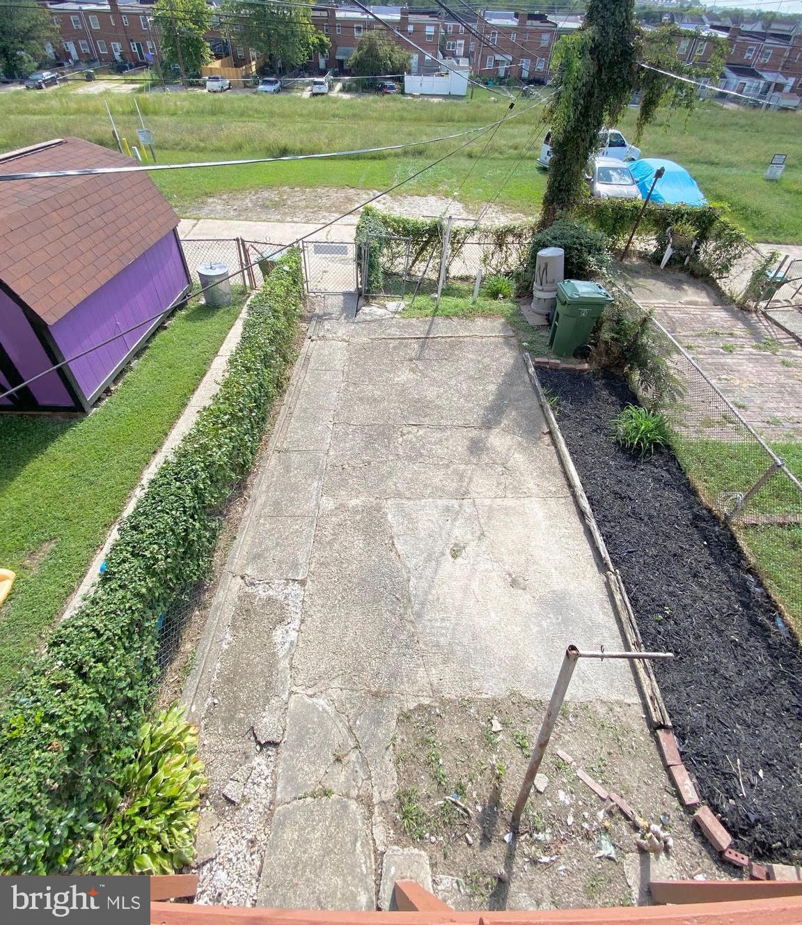 5019 Schaub Avenue Baltimore, MD 21206 - Photo 34 of 34 a view of a garden with an outdoor space