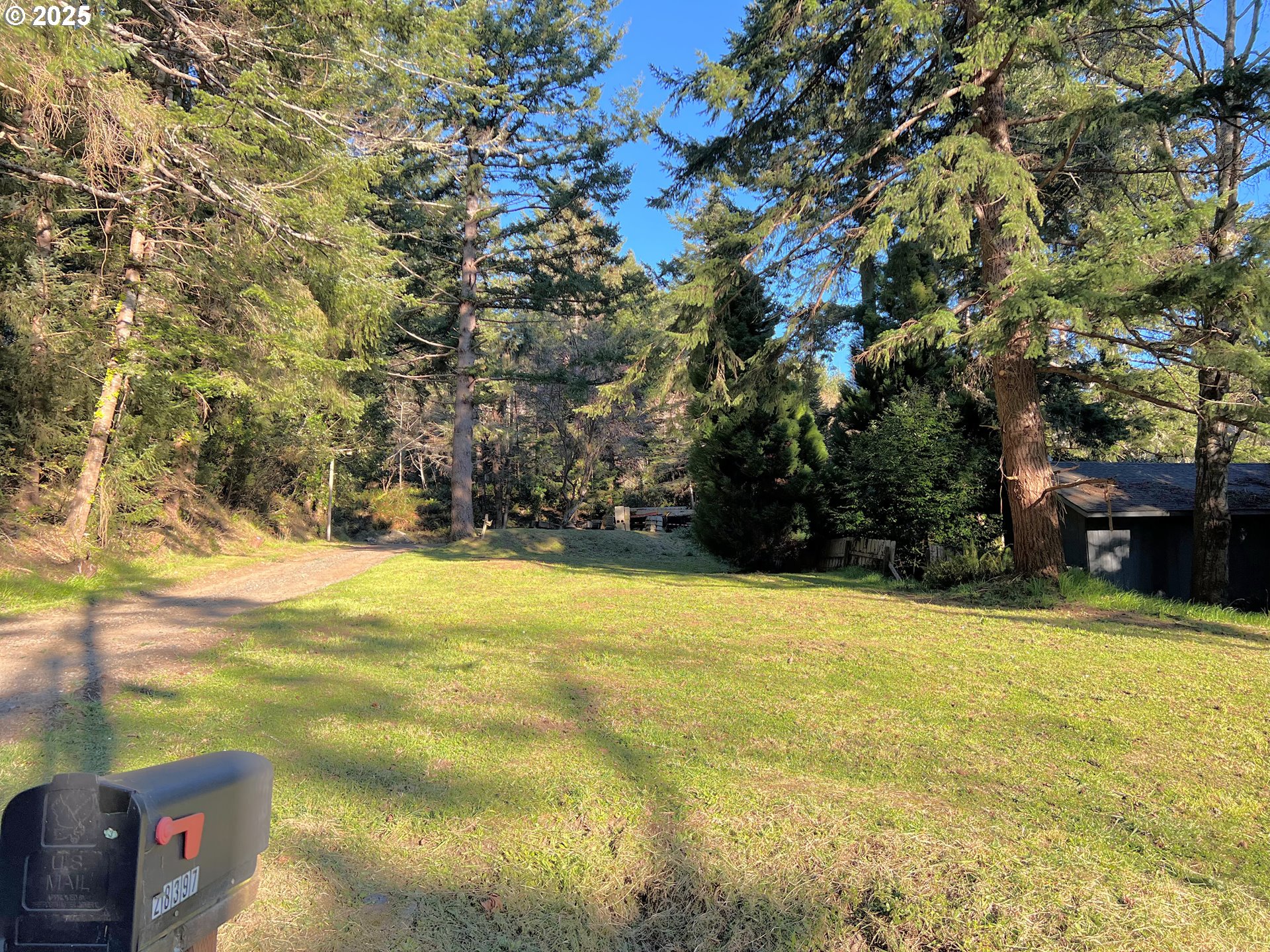 28397 Mateer Road Gold Beach, OR 97444 - Photo 4 of 17 a view of swimming pool with an outdoor space