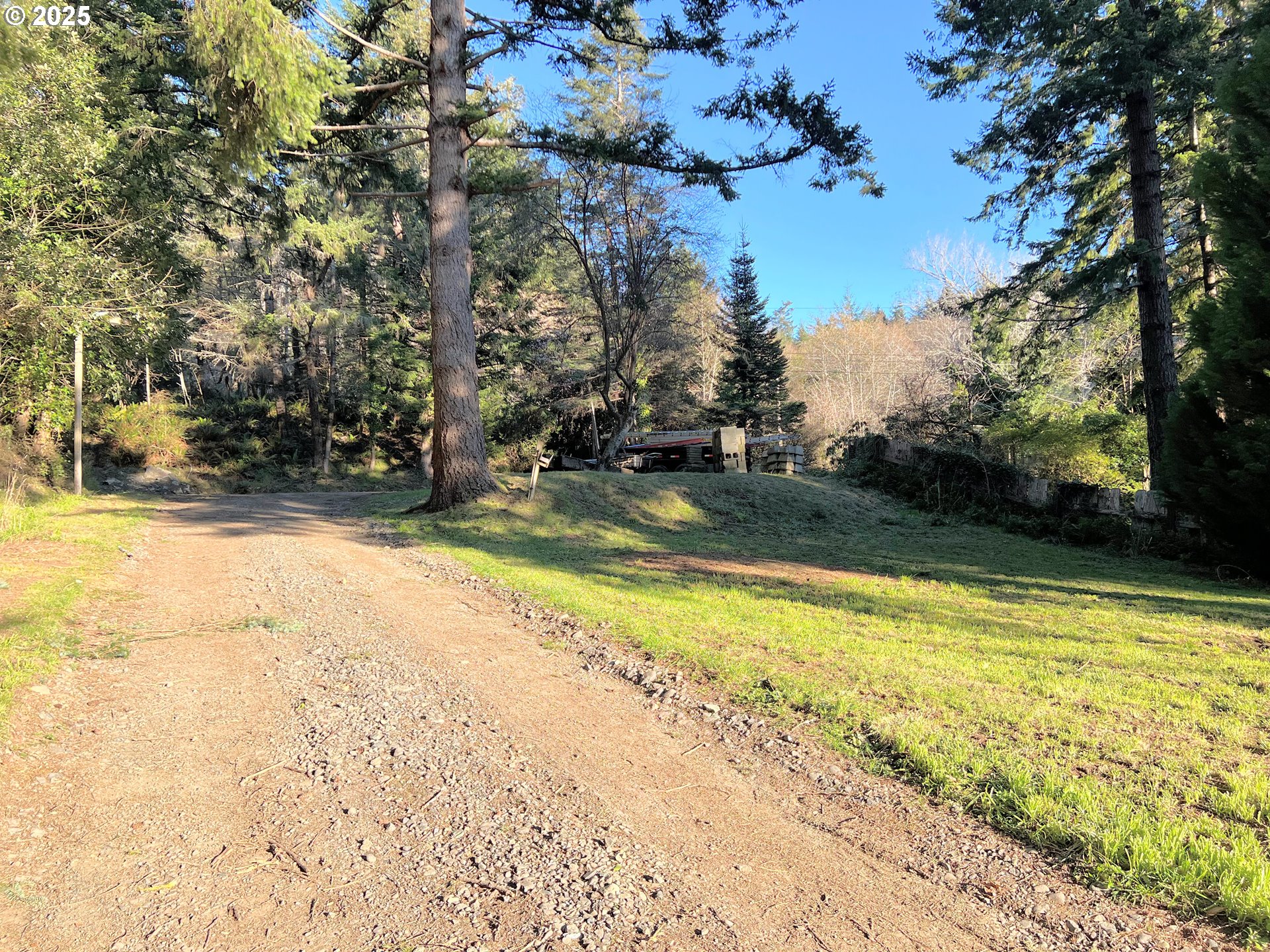 28397 Mateer Road Gold Beach, OR 97444 - Photo 8 of 17 a view of a swimming pool with an outdoor space and seating area