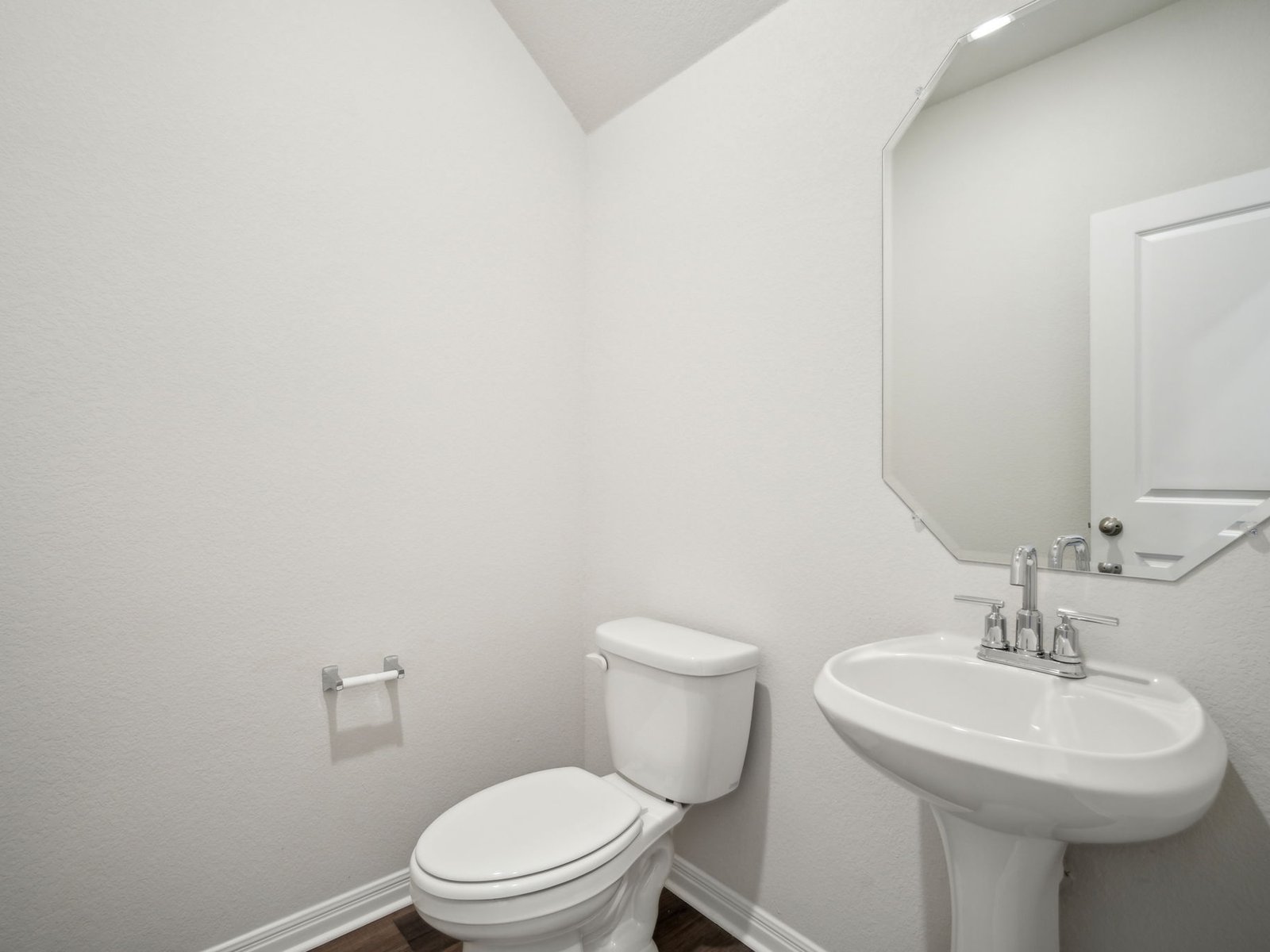 165 Calcite Road, Unit 3 Kyle, TX 78640 - Photo 8 of 17 a bathroom with a sink a toilet and mirror