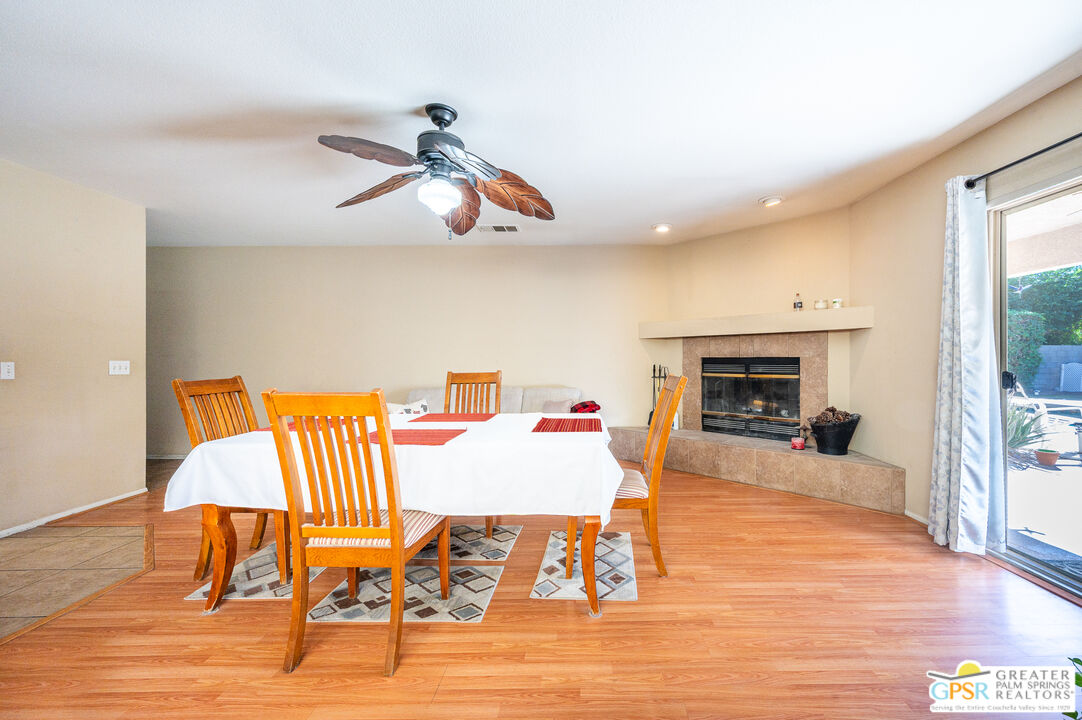 68655 Durango Road Cathedral City, CA 92234 - Photo 14 of 36 a living room with furniture and a fireplace