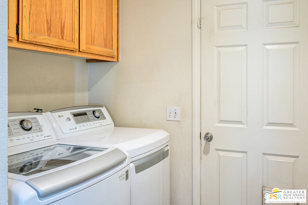 68655 Durango Road Cathedral City, CA 92234 - Photo 29 of 36 a utility room with dryer and washer