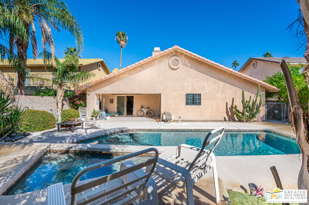 68655 Durango Road Cathedral City, CA 92234 - Photo 30 of 36 a view of house with swimming pool outdoor seating