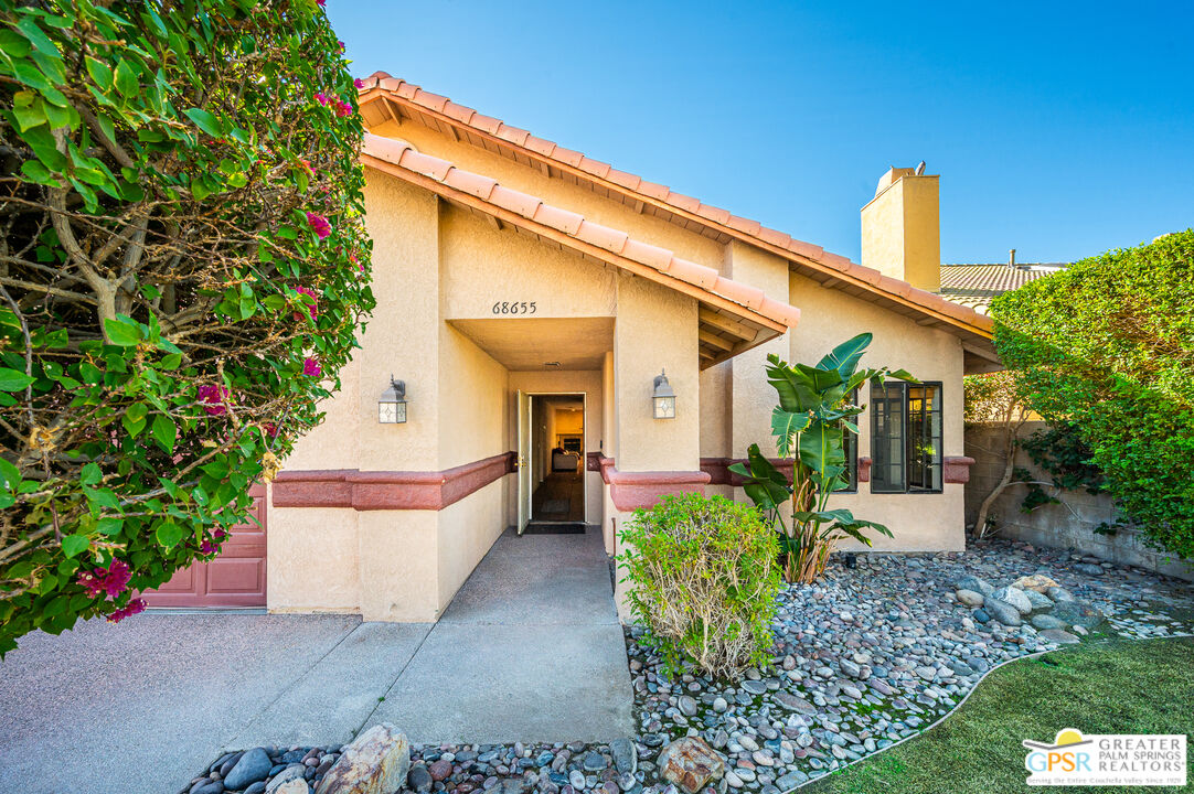 68655 Durango Road Cathedral City, CA 92234 - Photo 33 of 36 a front view of a house with a yard