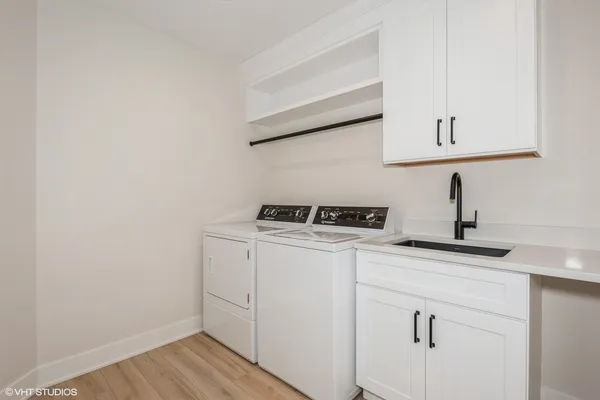a view of a kitchen with sink