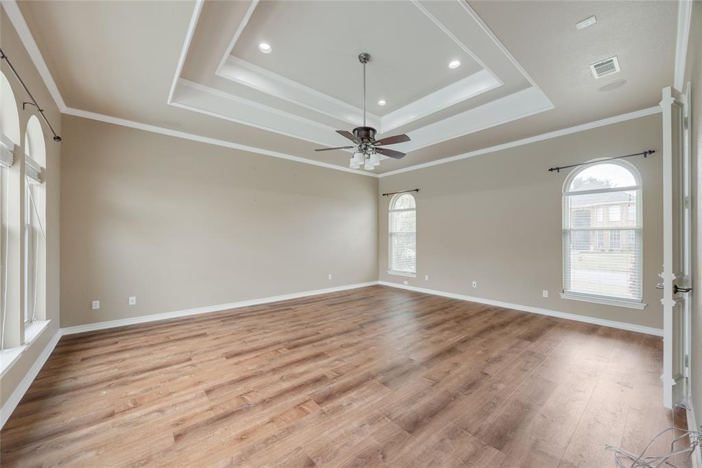 1201 Findlay Drive Arlington, TX 76012 - Photo 19 of 35 wooden floor in an empty room with a window