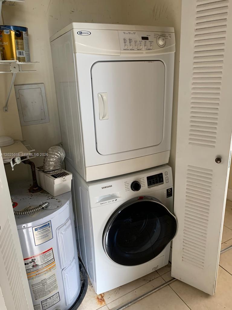 400 Southwest 2nd Street, Unit 201 Miami, FL 33130 - Photo 10 of 12 a utility room with dryer and washer