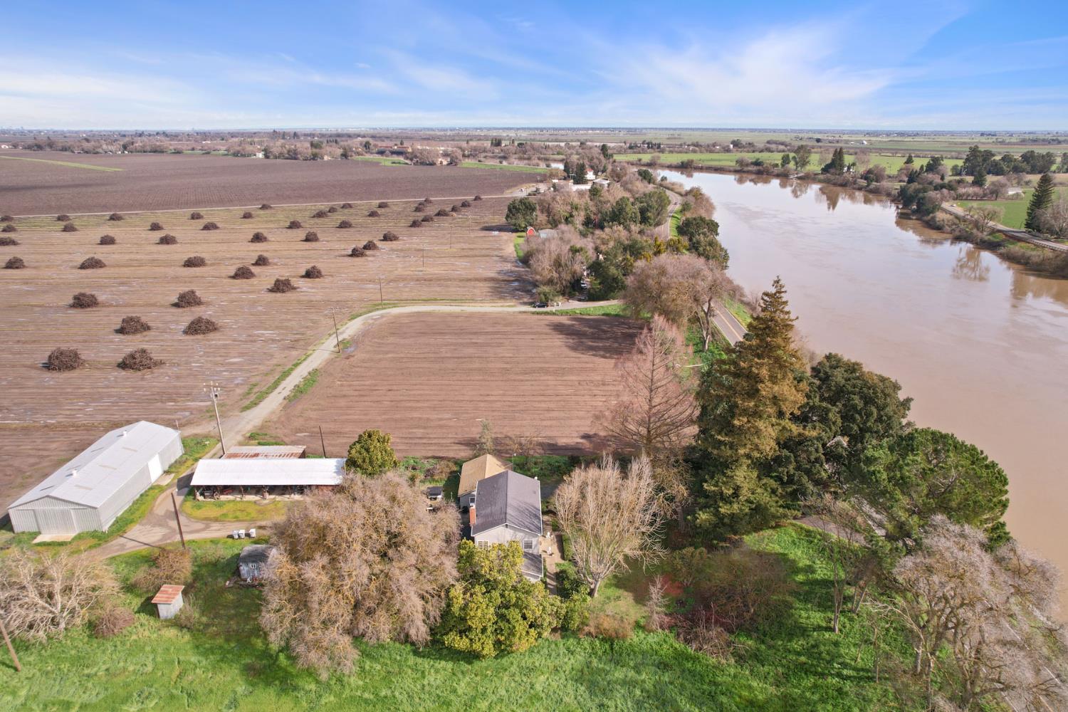 39670 South River Road Clarksburg, CA 95612 - Photo 12 of 85 an aerial view of beach and residential houses with outdoor space