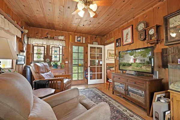 a front view of house with yard and green space