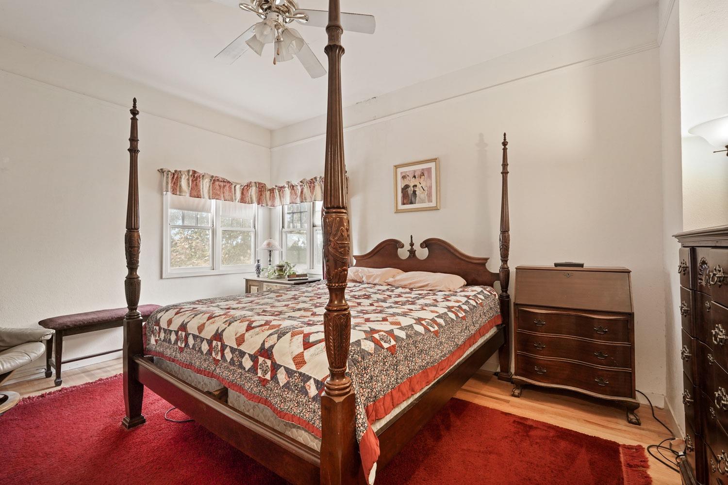 39670 South River Road Clarksburg, CA 95612 - Photo 34 of 85 a bed sitting in a bedroom next to a window