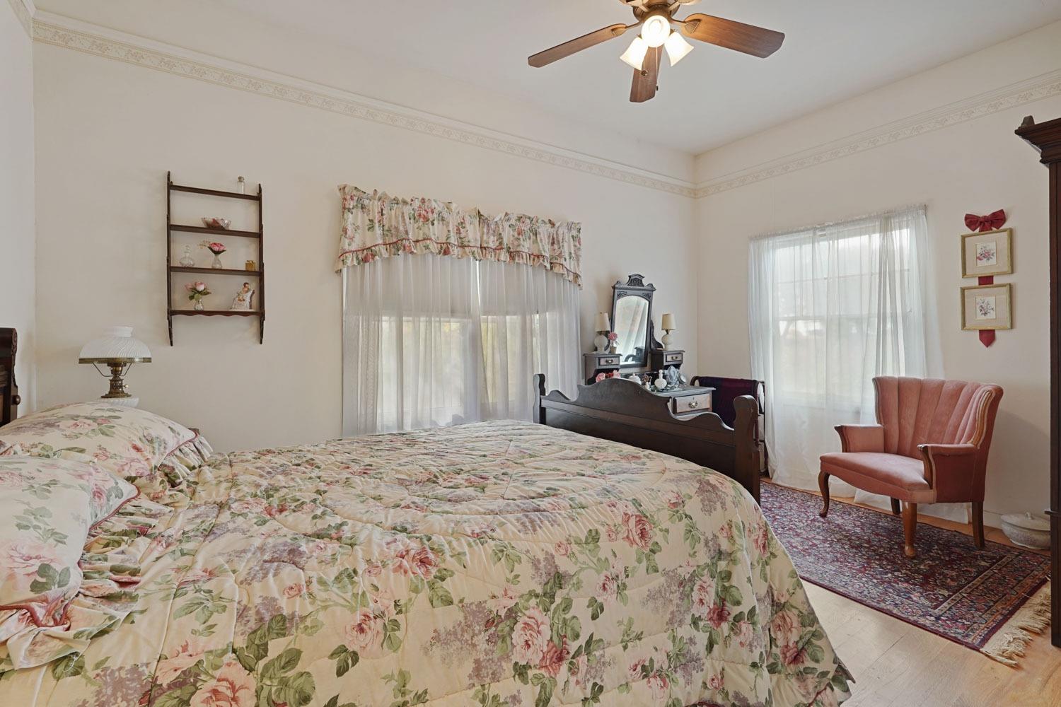 39670 South River Road Clarksburg, CA 95612 - Photo 40 of 85 a bedroom with a bed and a chair