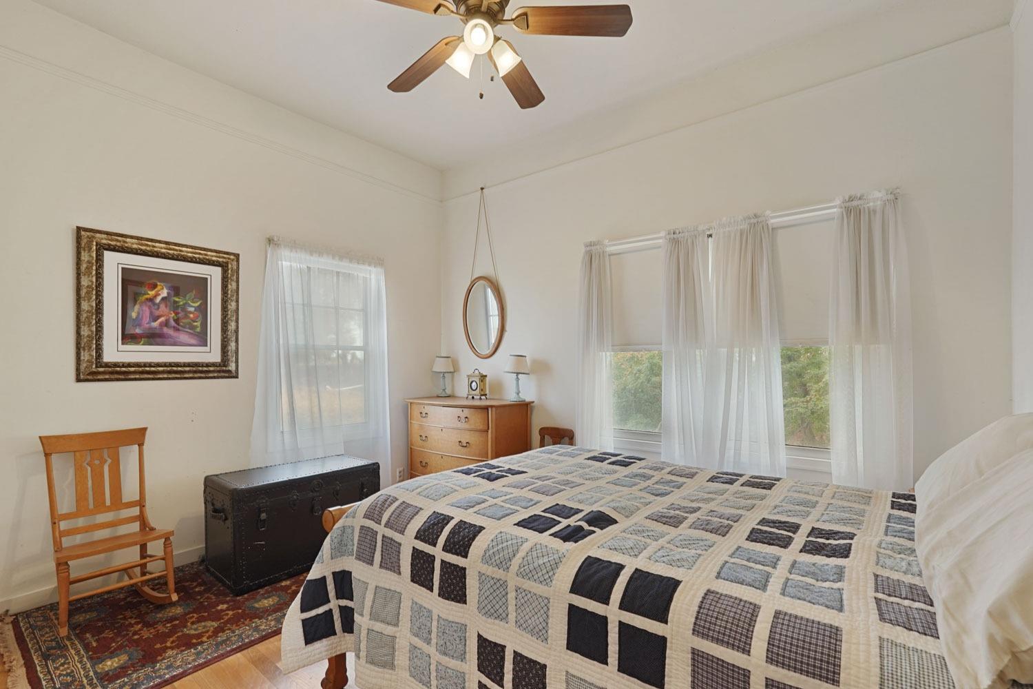 39670 South River Road Clarksburg, CA 95612 - Photo 41 of 85 a bedroom with a large bed and a window