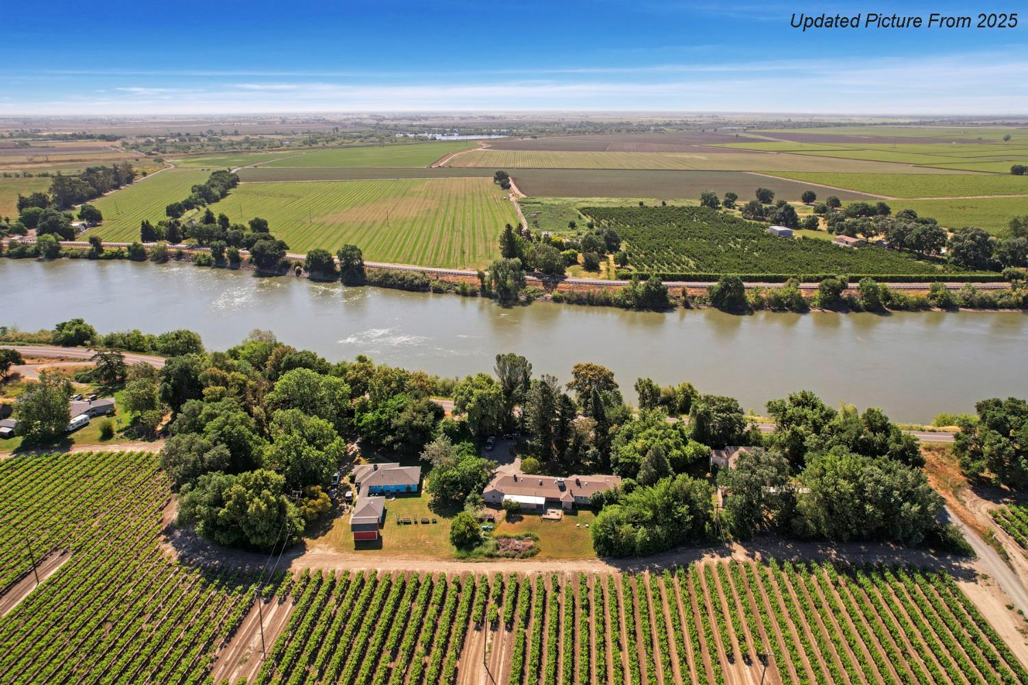 39670 South River Road Clarksburg, CA 95612 - Photo 59 of 85 a view of a lake with couches in the patio
