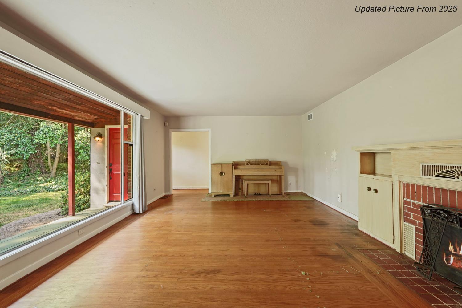 39670 South River Road Clarksburg, CA 95612 - Photo 67 of 85 a view of an empty room with a fireplace and a window